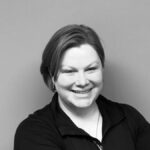 Black and white headshot of our DMR Method physical therapy assistant, Joy Shrunk